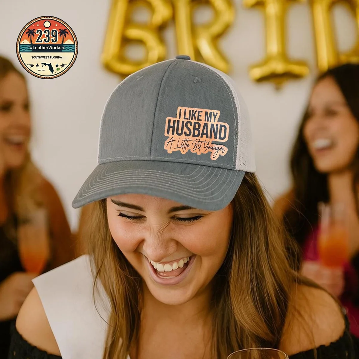 View 2 of I Like My Husband A Little Bit Younger Trucker Hat