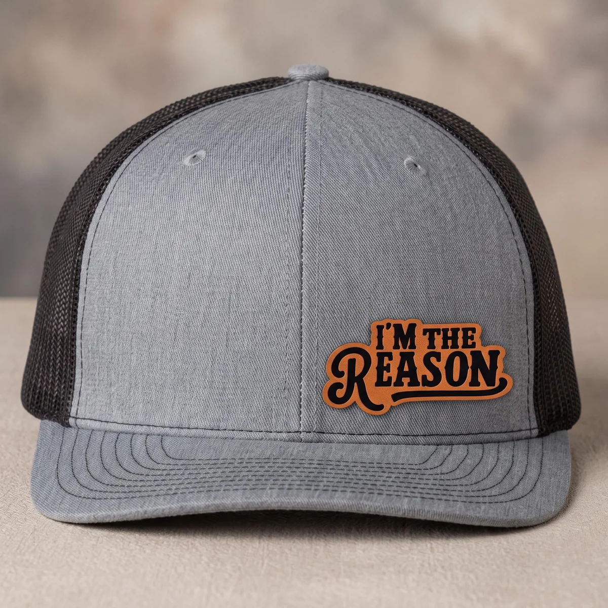 I'm The Reason Leather Patch Trucker Hat